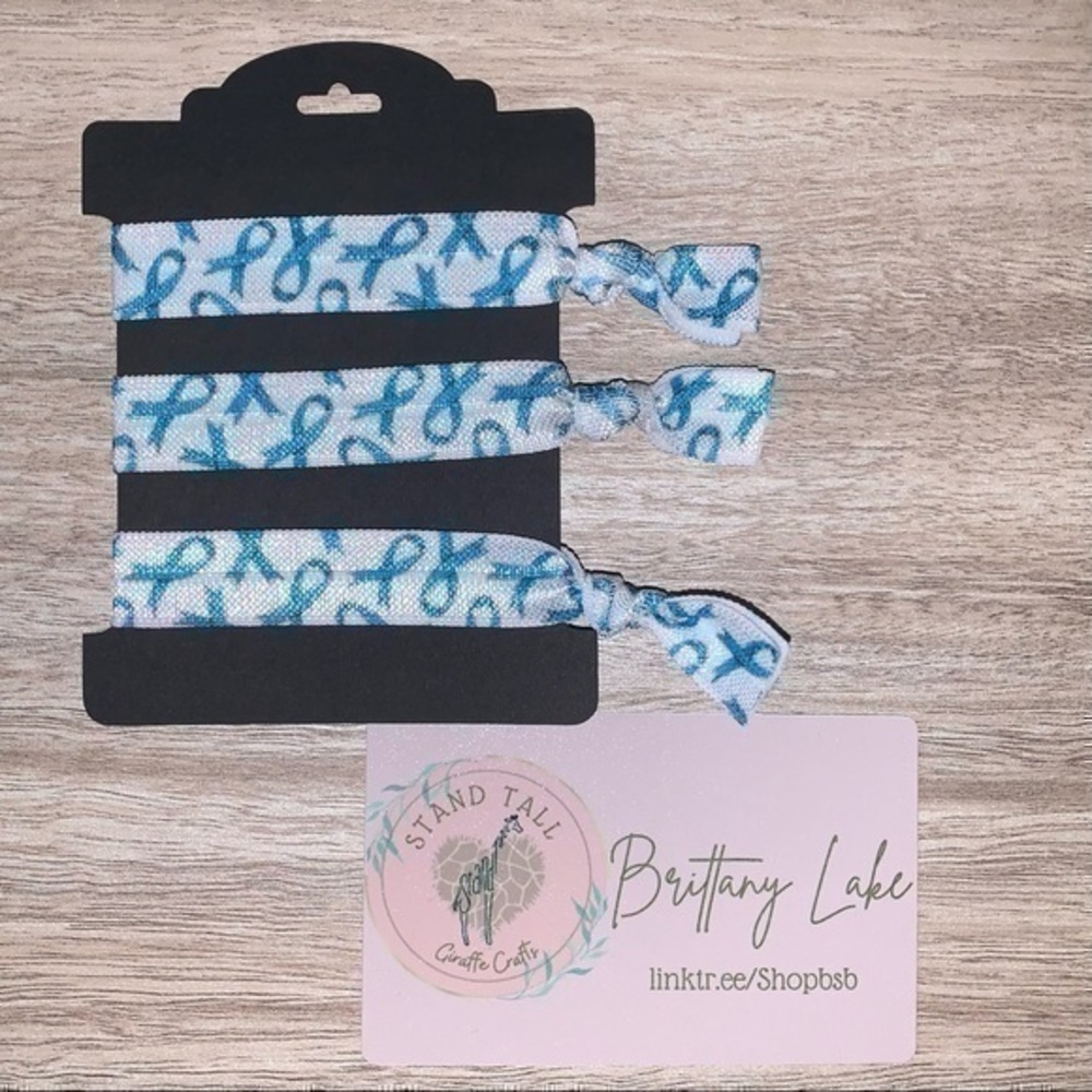$7ea or 3/$15 Ovarian cancer awareness ribbon hair ties handmade new